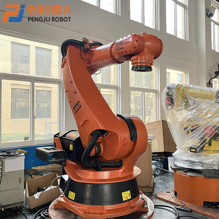 KUKA KR210-2 การปั่นจุด, การปั่นพิมพ์, การทําพัลเลติก, การบรรจุและการปลดของชิ้นส่วน, การแปรรูป, การจัดการของชิ้นส่วน