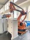 KUKA KR240 อุตสาหกรรมที่ใช้งาน โรบอตพาเล็ตที่กําหนดเองที่มีส่วนประกอบหลักของ PLC และพรอตโคลคการสื่อสาร DeviceNet