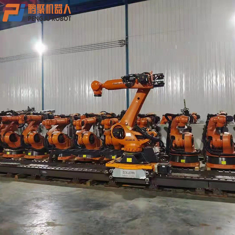 KUKA KR210-2 การปั่นจุด, การปั่นพิมพ์, การทําพัลเลติก, การบรรจุและการปลดของชิ้นส่วน, การแปรรูป, การจัดการของชิ้นส่วน