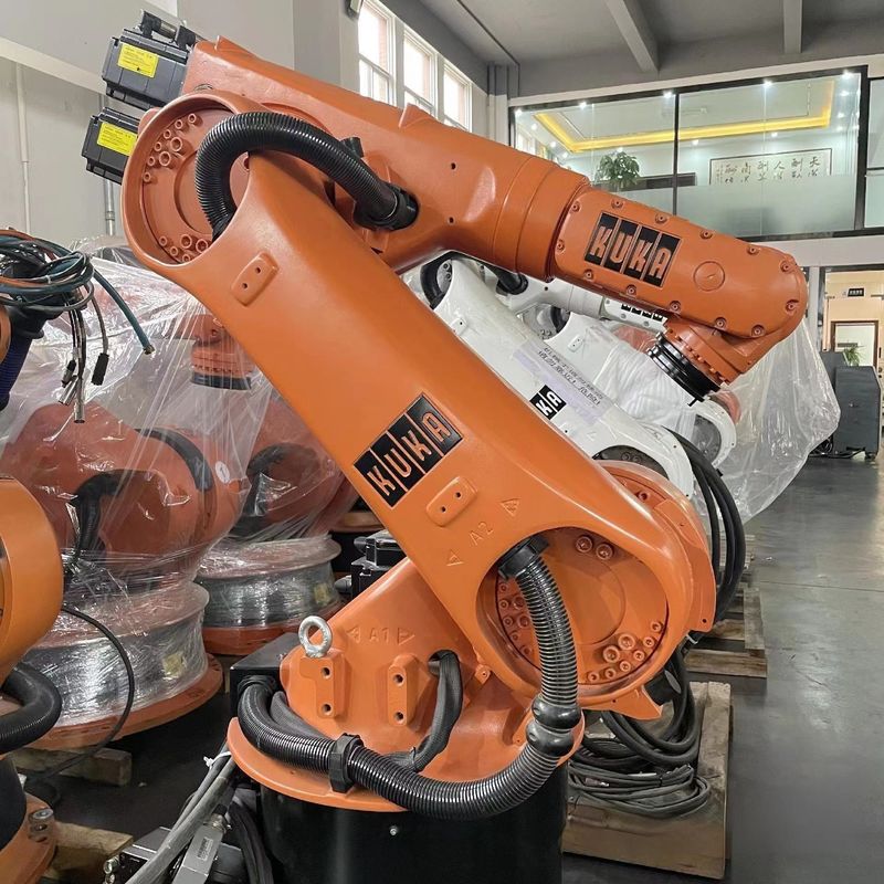 Kuka KR30 หุ่นยนต์ปั่นเส้นโค้งเก้าแกน ด้วย H Kuka Shape Positioner การปั่นเส้นโค้ง, การปั่นจุด, การปั่นสแตน