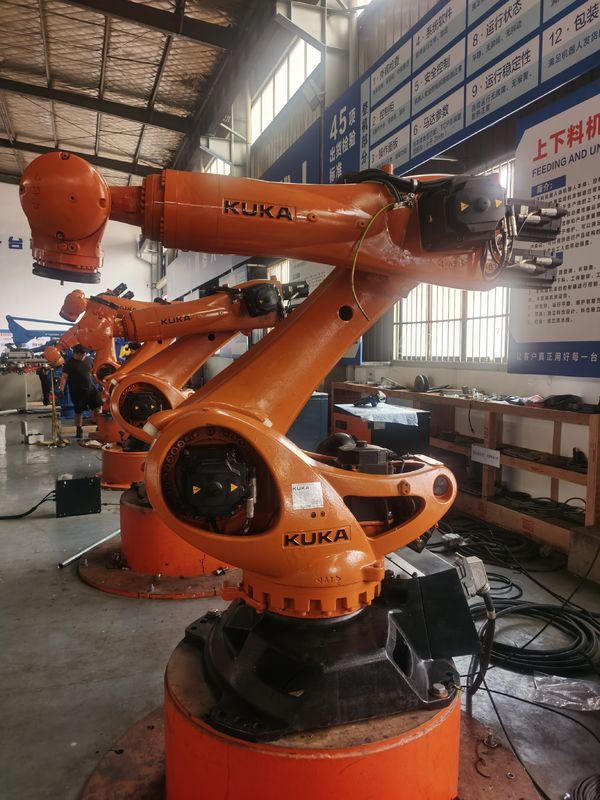 KUKA KR300 R2500 Ultra 300kg Payload 2500mm Reach ใช้หุ่นยนต์ KUKA ด้วยความซ้ํา ±0.1 มม และ Kuka โปรแกรมการบรรจุหุ่นยนต์ การจัดการ การบด การบด