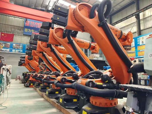 KUKA แขนหุ่นยนต์ใช้แล้ว KR210 C4 ตู้ควบคุม การจัดการ การซ้อน การโหลด การแกะสลัก การปั๊ม